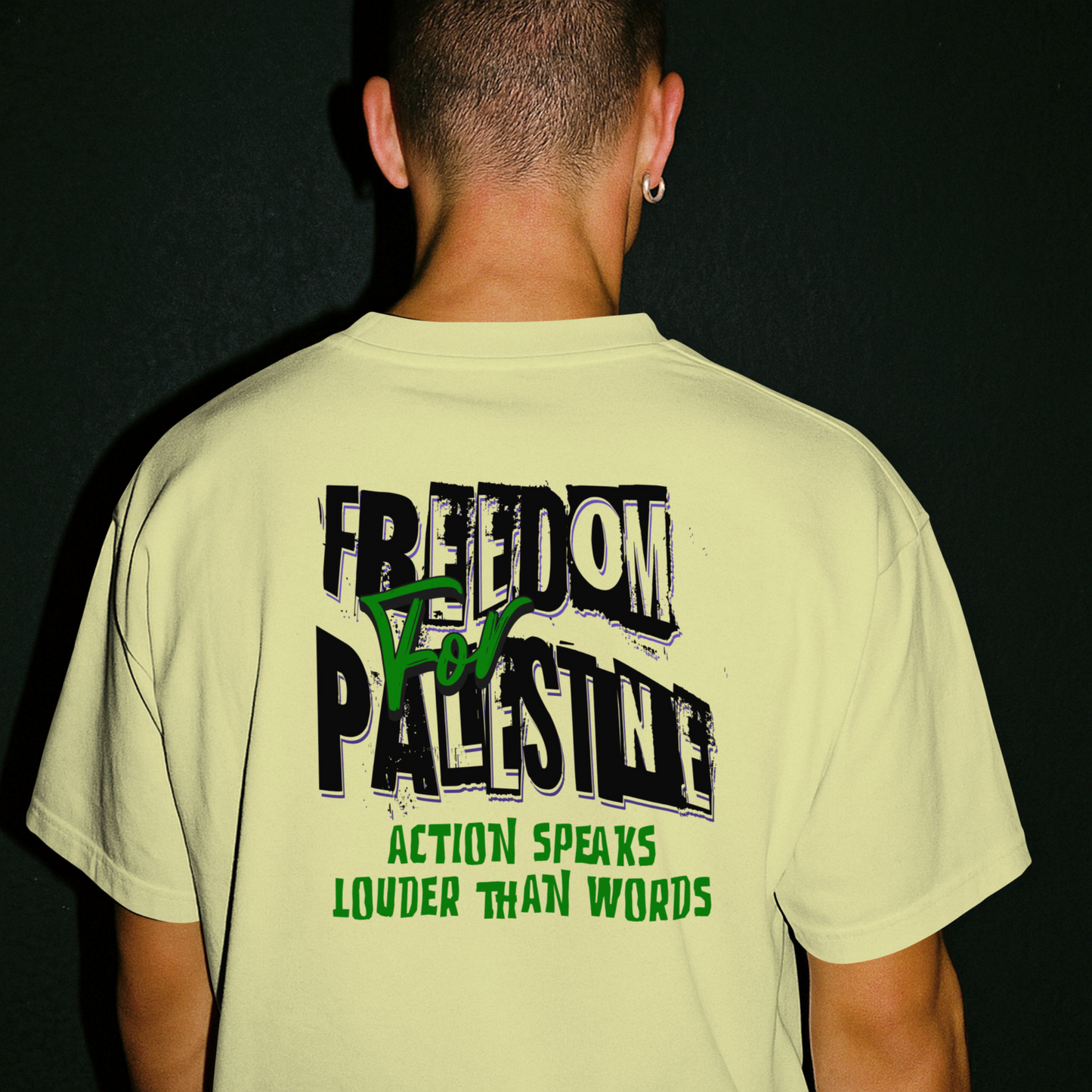 Freedom for Palestine tee in off white with black and green text
