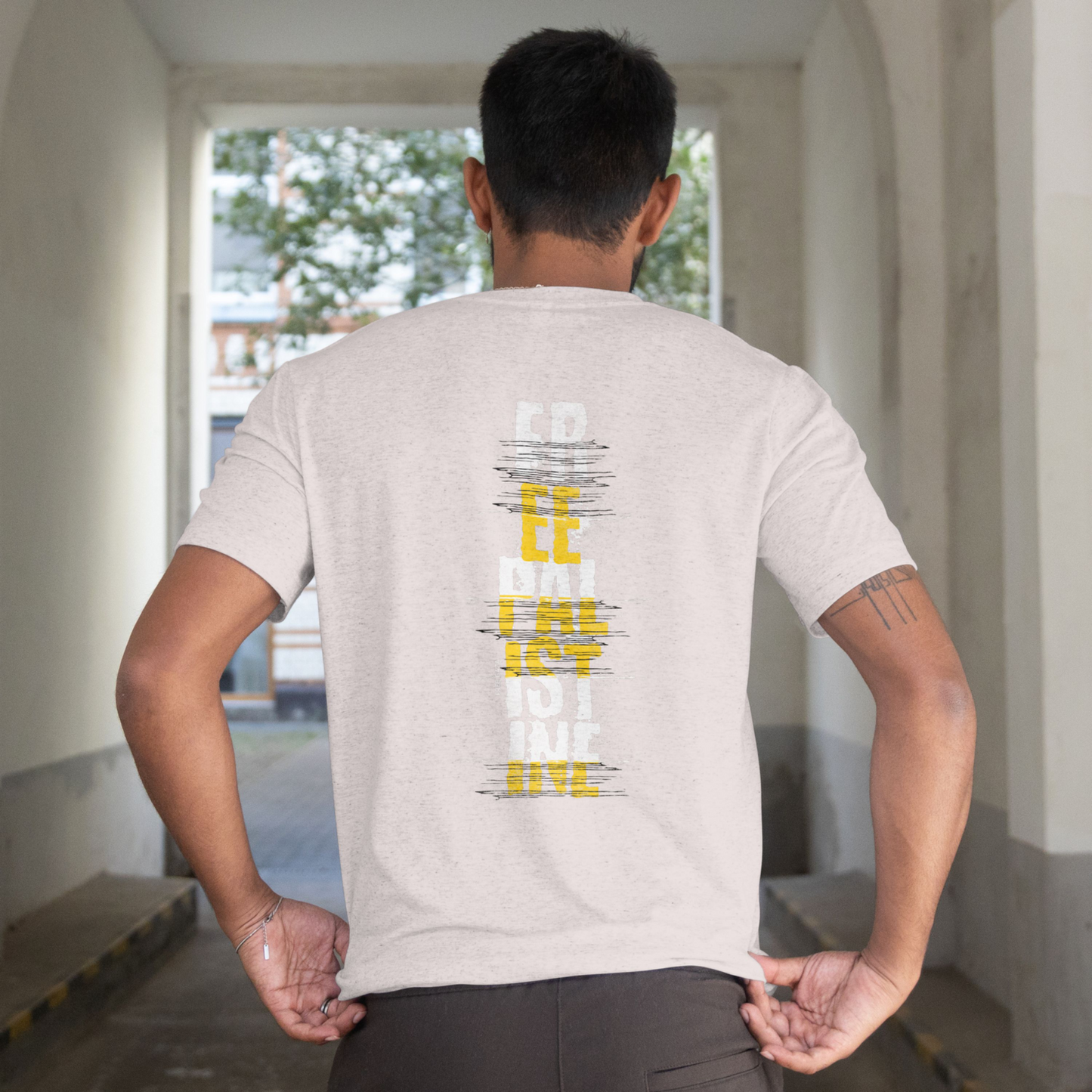 Free Palestine- vertical statement tee in grey, with white and yellow design