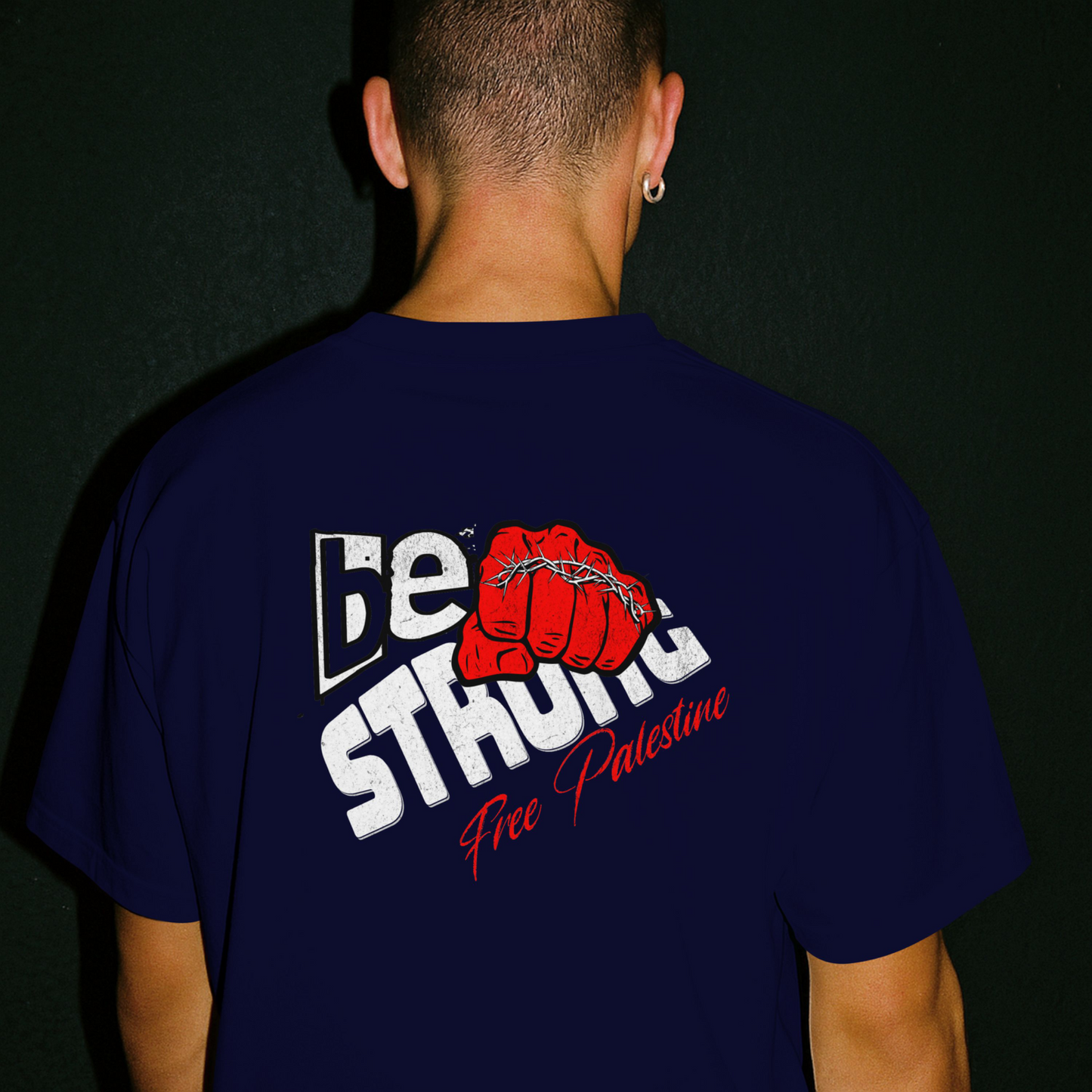 Free Palestine tee shirt in navy with be strong graphic design